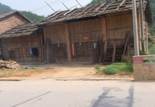 A roadside village using a lot of wood construction.